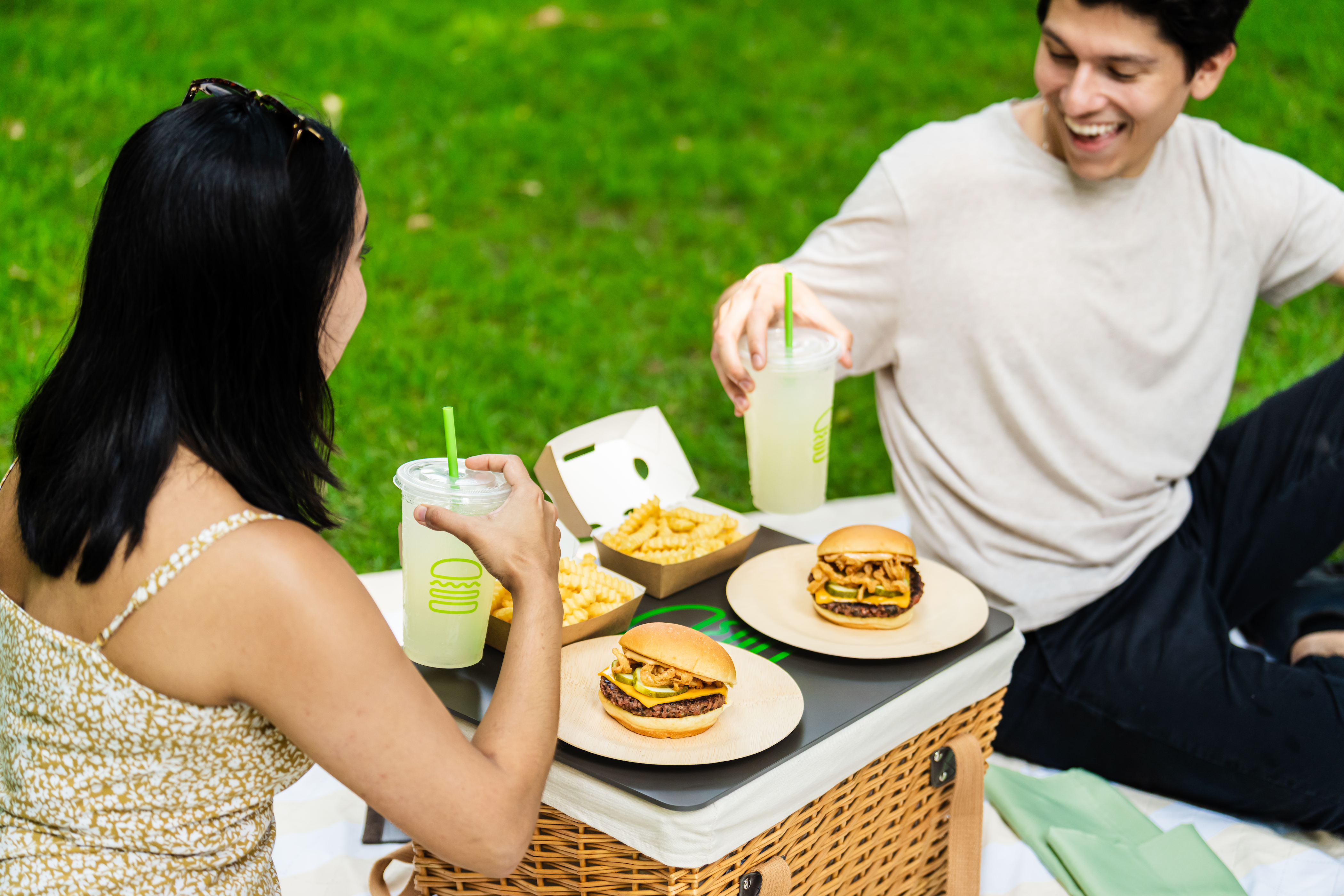 Two people enjoying a "Veg Out" picnic 