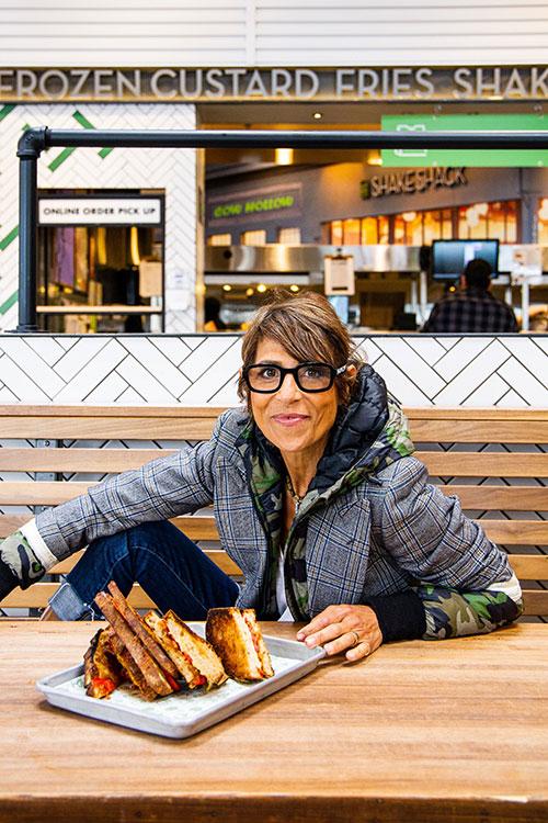 https://shakeshack.com/sites/default/files/styles/blog_hero/public/2021-09/crenn-at-table.jpeg?itok=w2xChVvj