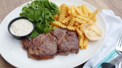 Shake Shack & Pat La Frieda - Picture of steak, fries, and salad on a white plate.