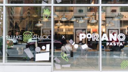 Porano storefront with shake shack logo on the glass