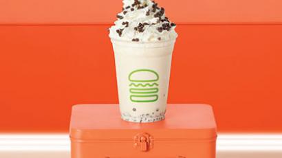 shake with chocolate toppings sitting on a lunch box
